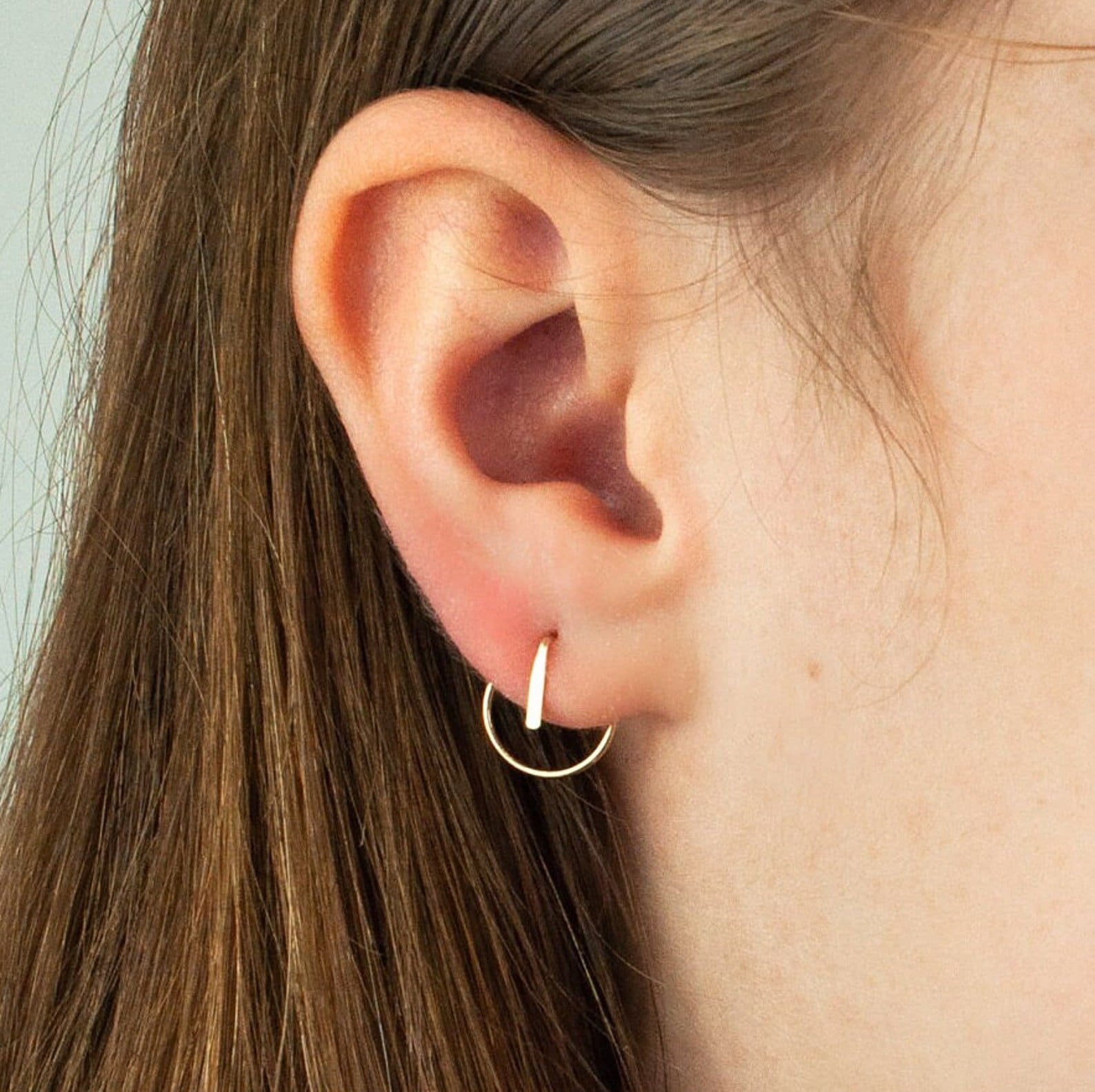 Statement circle ear jacket earrings