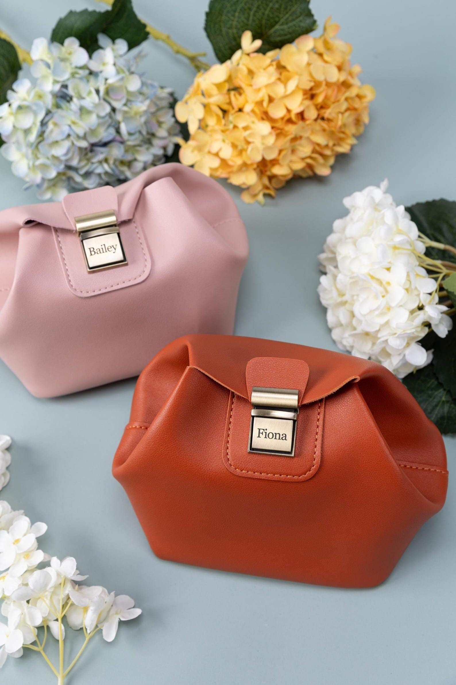 Personalized clutch makeup bag with tuck lock closure — elegant custom gift for her