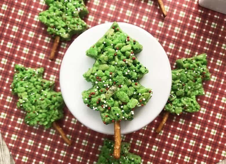 Christmas tree Rice Krispie treats decorated with candy ornaments