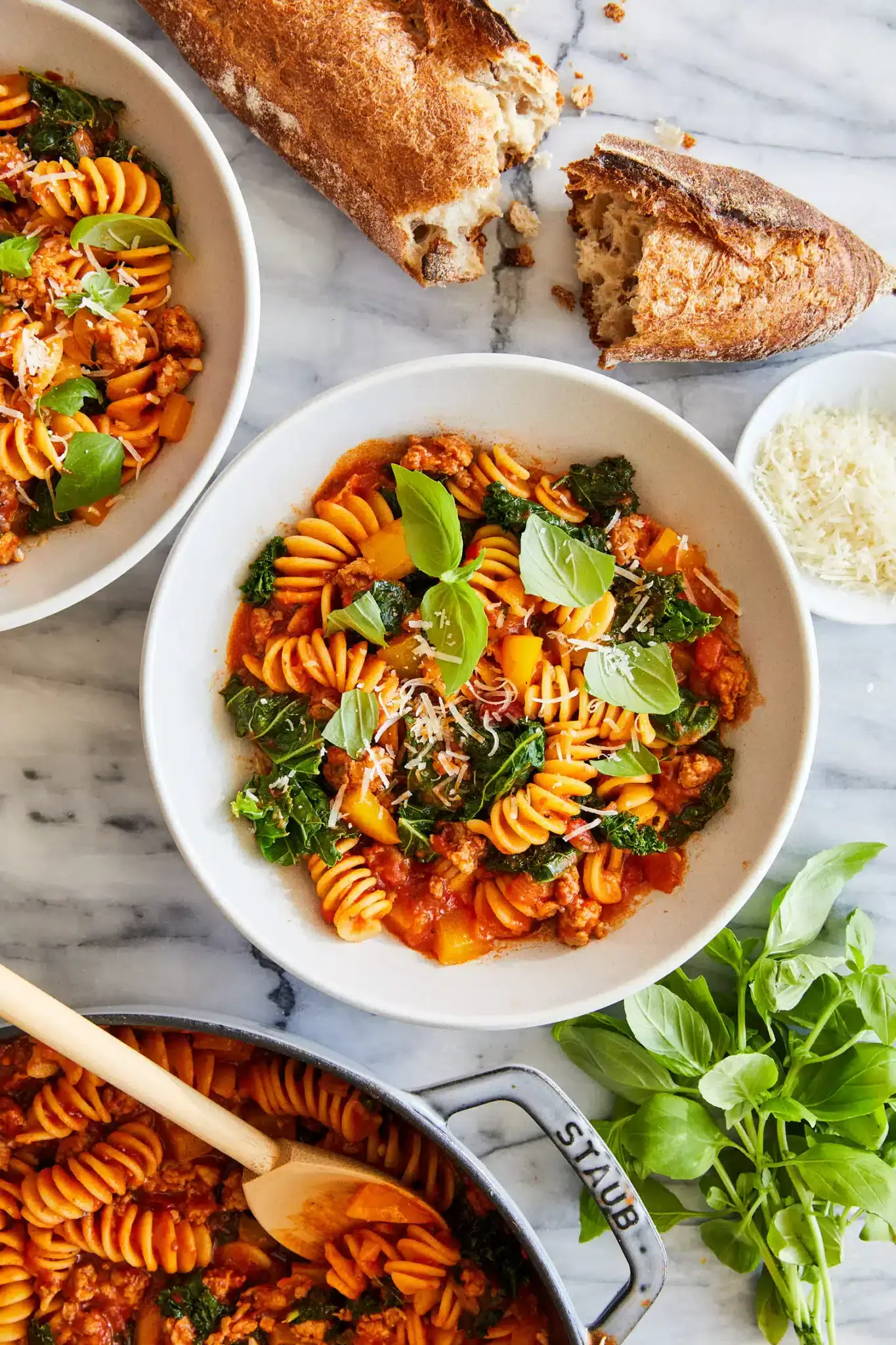 One-pot sausage pasta in a skillet with creamy sauce