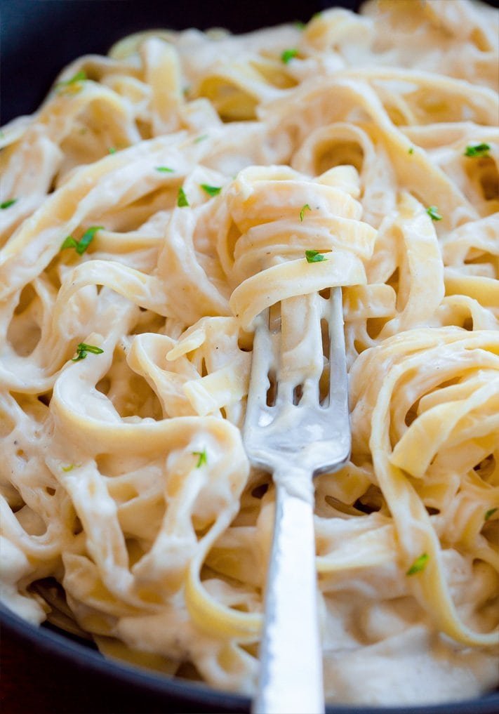Healthy cauliflower Alfredo sauce blended smooth and creamy — a light, veggie-packed alternative to classic cream Alfredo