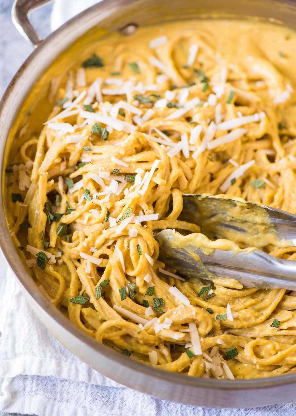 Creamy pumpkin pasta sauce coating fettuccine for a cozy fall meal