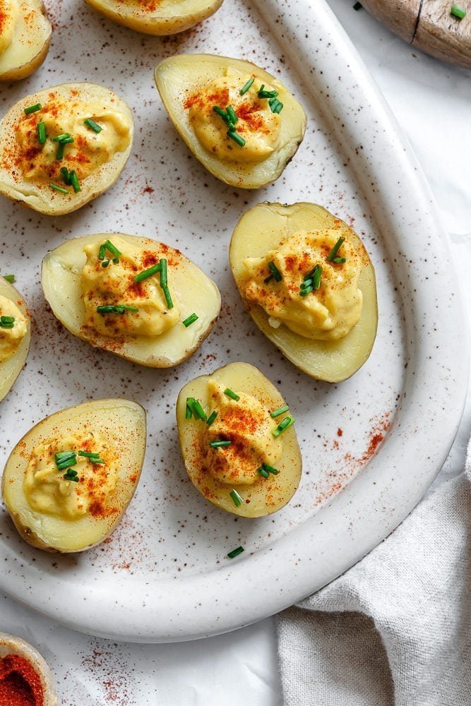 Vegan deviled potatoes arranged on a serving tray.