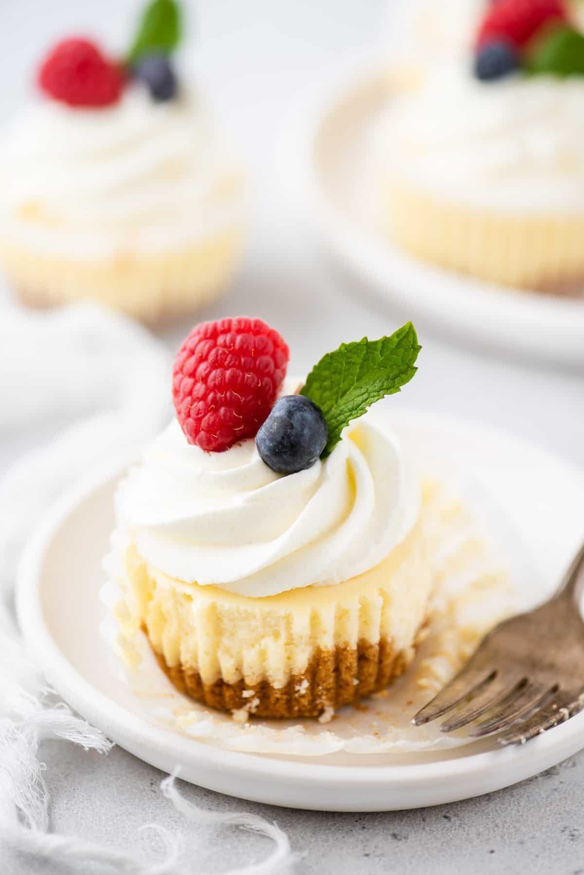 Mini cheesecakes topped with berries for Valentine’s Day