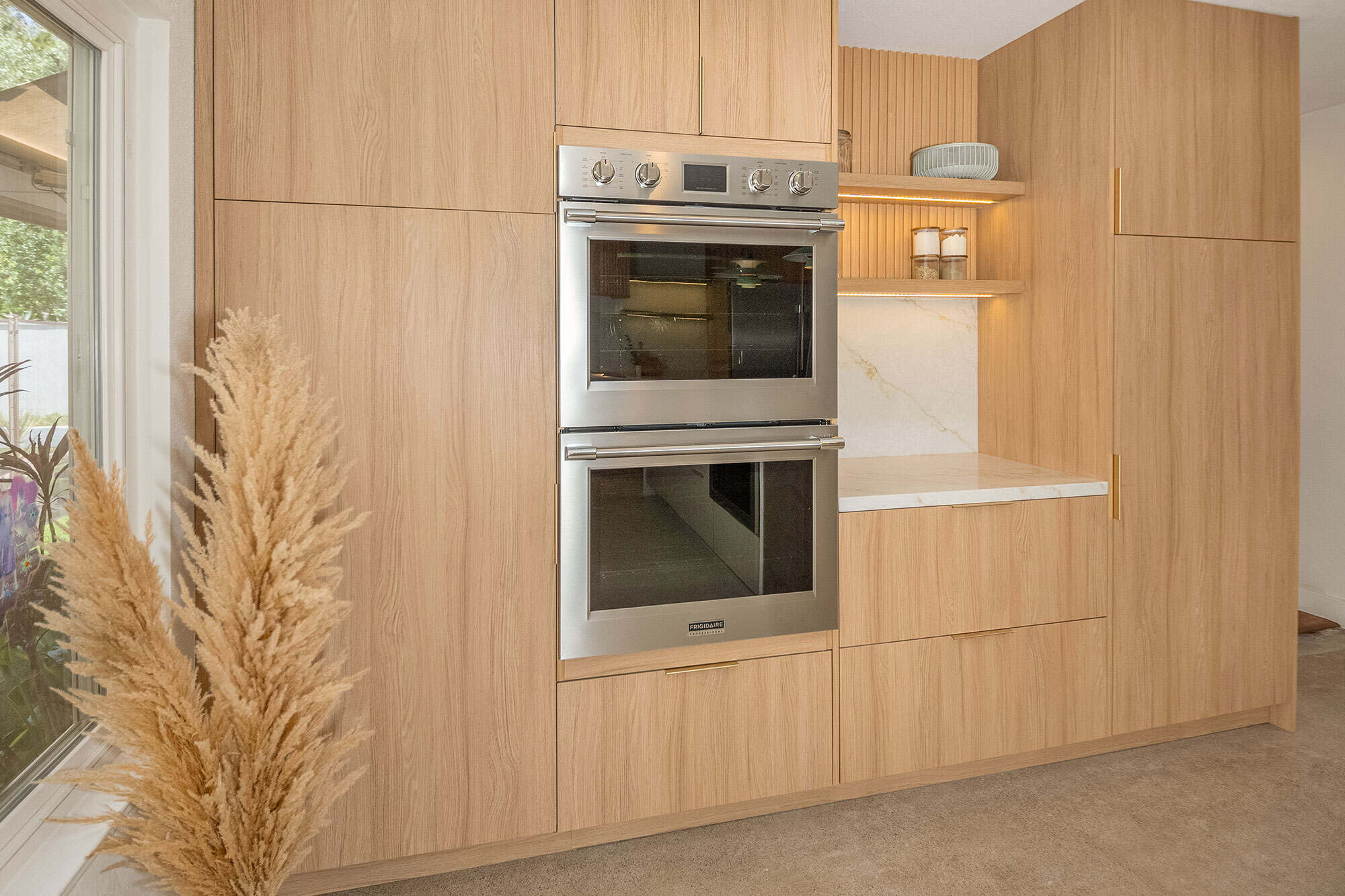 A kitchen remodel with wooden cabinets and a stove in mission vieho