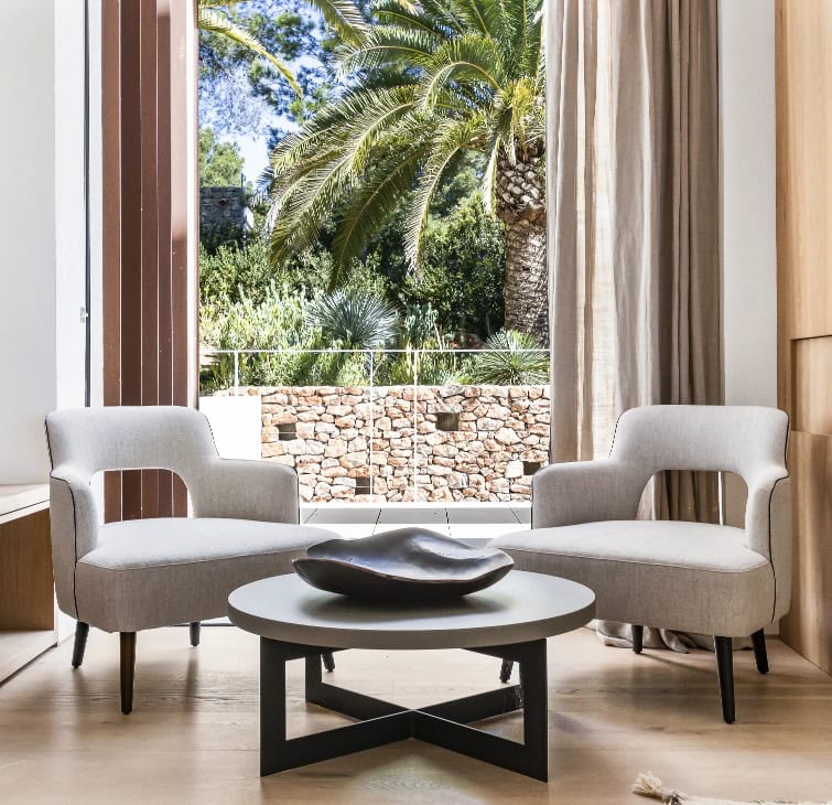 Villa Luba – sitting area overlooking a Mediterranean garden in San José, Ibiza