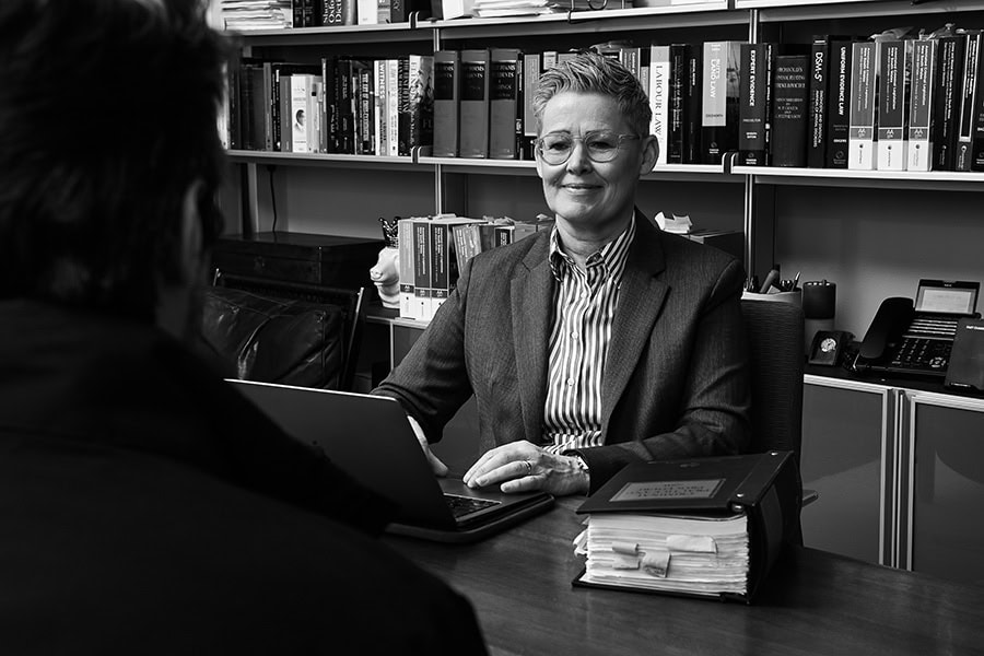 Traffic lawyer NSW discussing a suspended licence matter with a client
