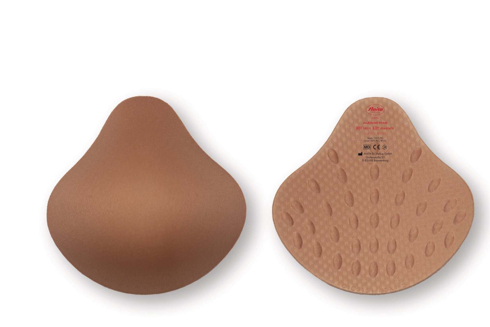Pair of brown breast form inserts: left shows a smooth outer surface, right shows the textured underside with branding.