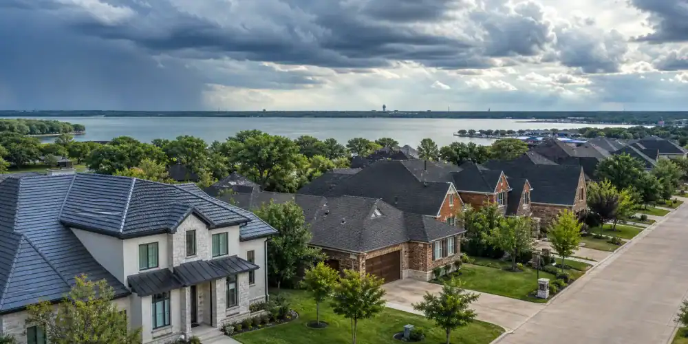 Residential homes along a tree-lined street in The Colony, Texas