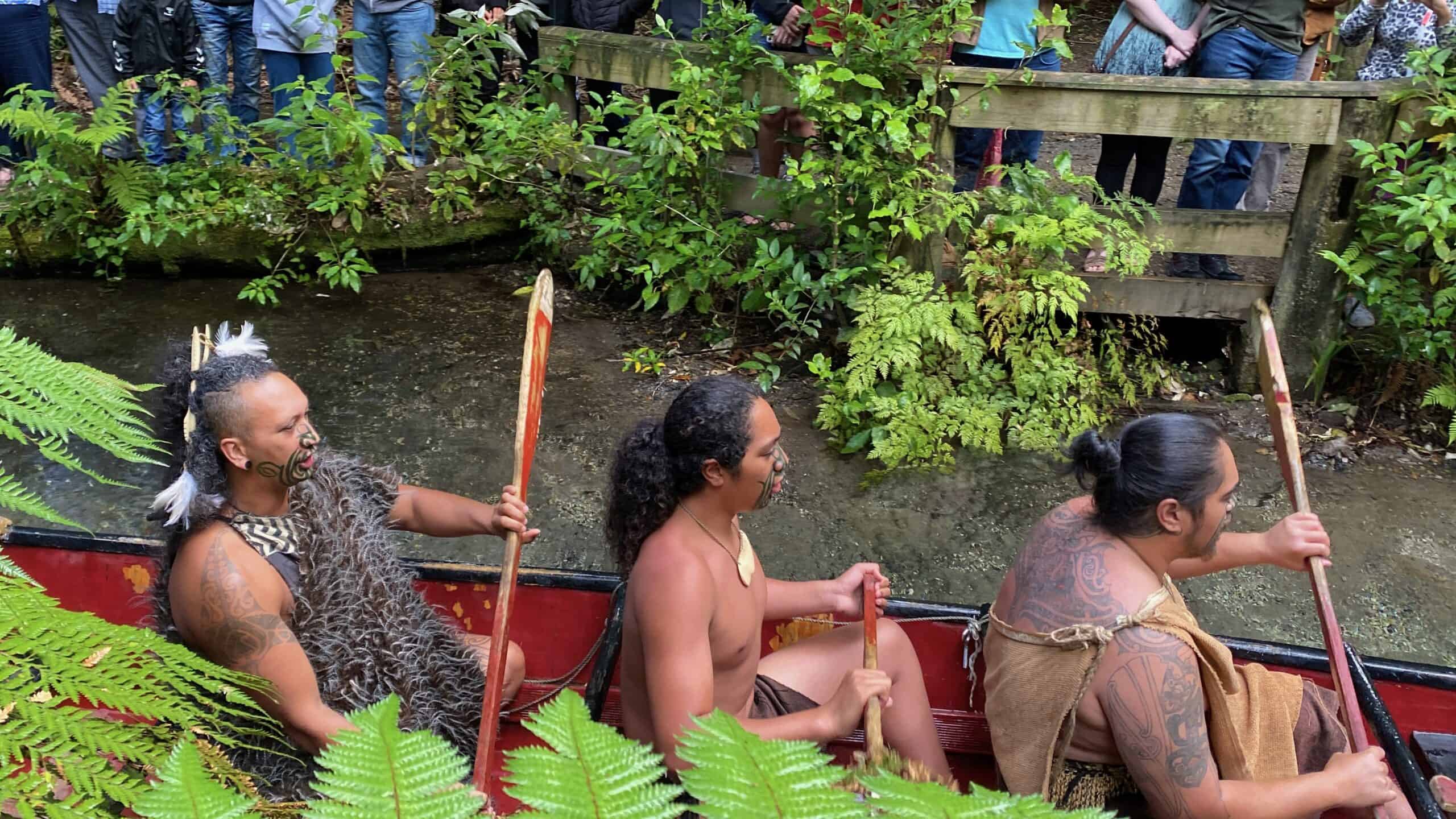 The Maori people arriving to the village