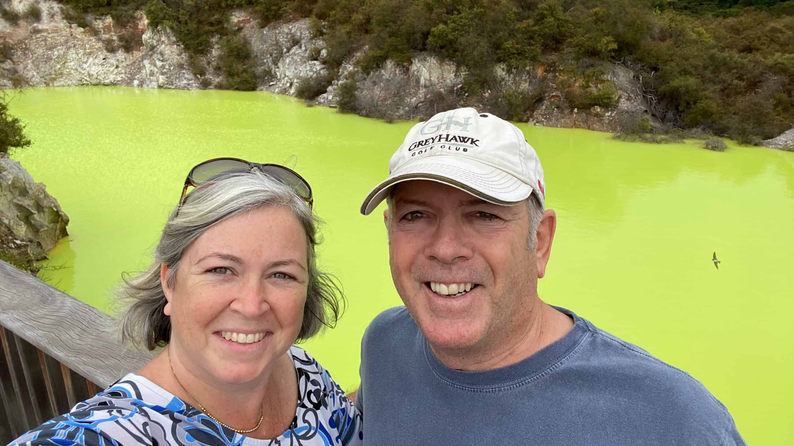 Our picture in front of an amazing green thermal spring. These kind of views make New Zealand worth visiting