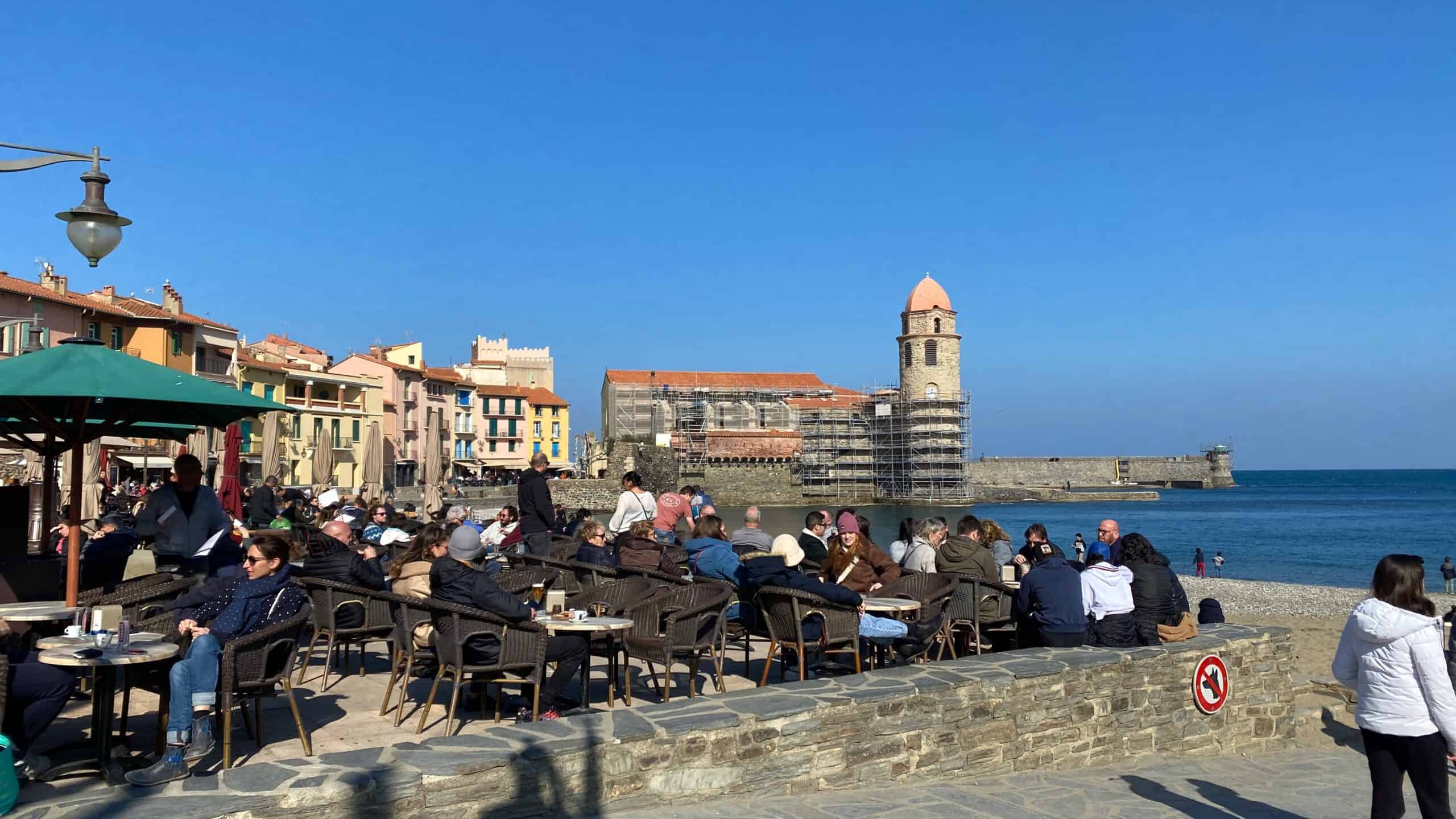 People eating outside at cafes in the off season