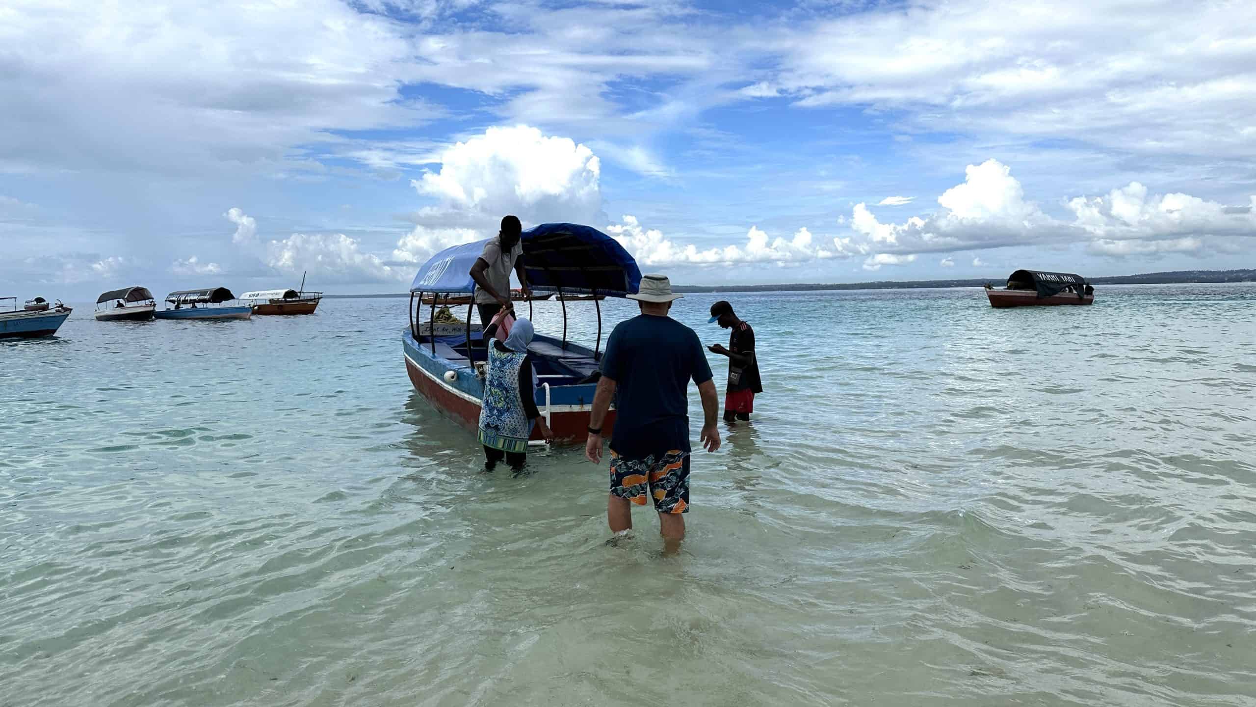 Walking to our boat from Prison Island