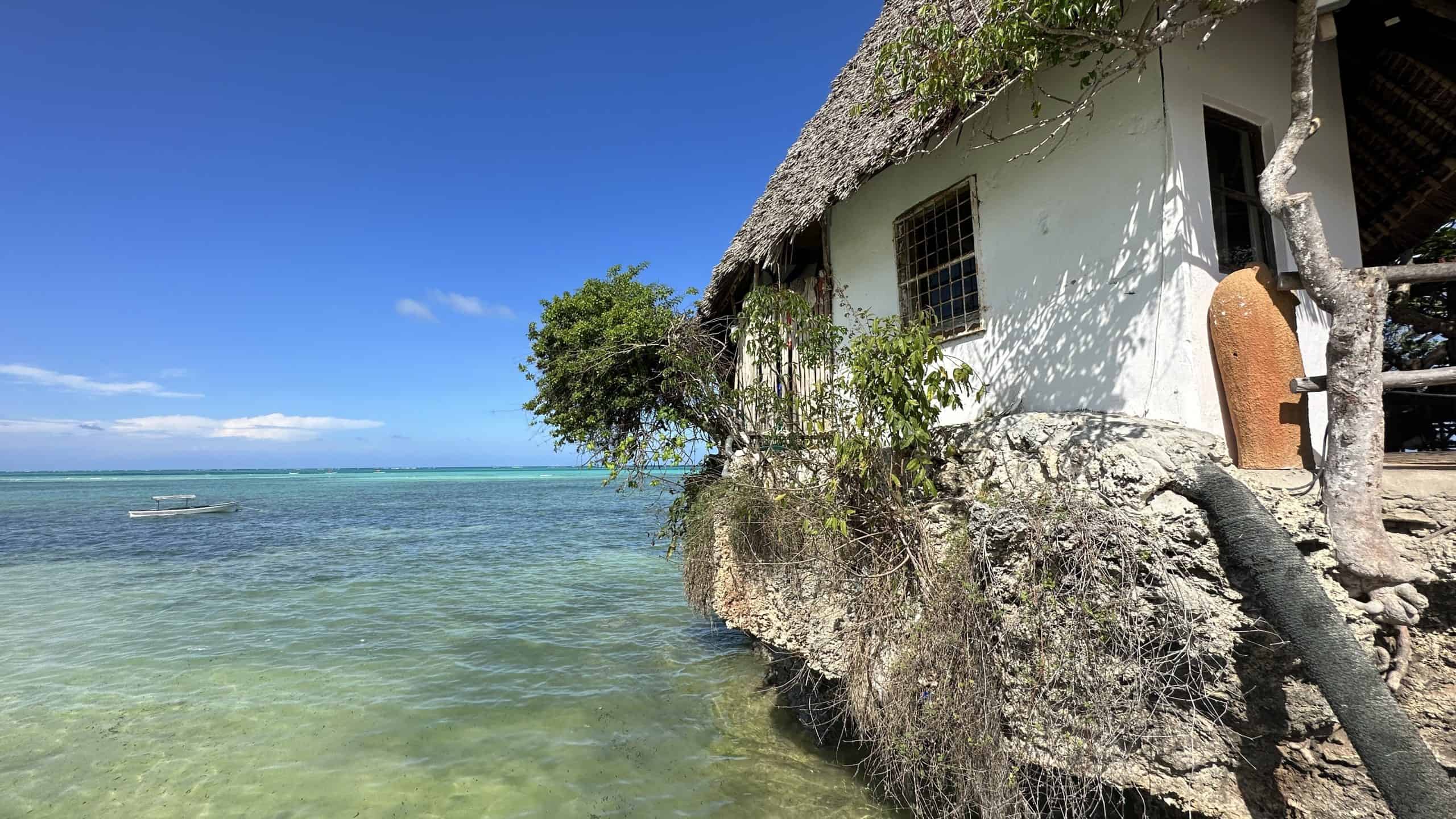 The building sitting on a rock