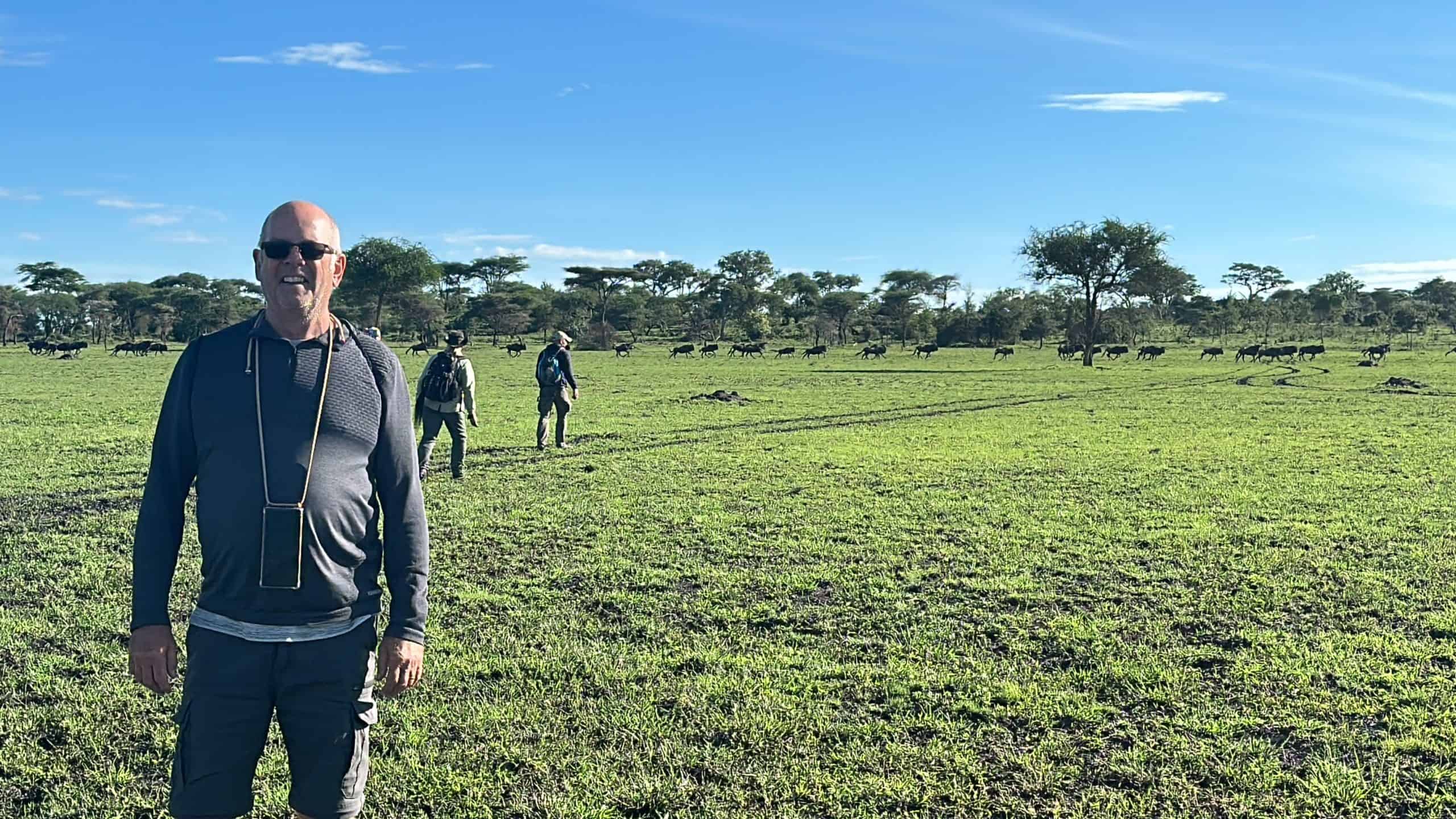 Walking in front of the wildebeest migration