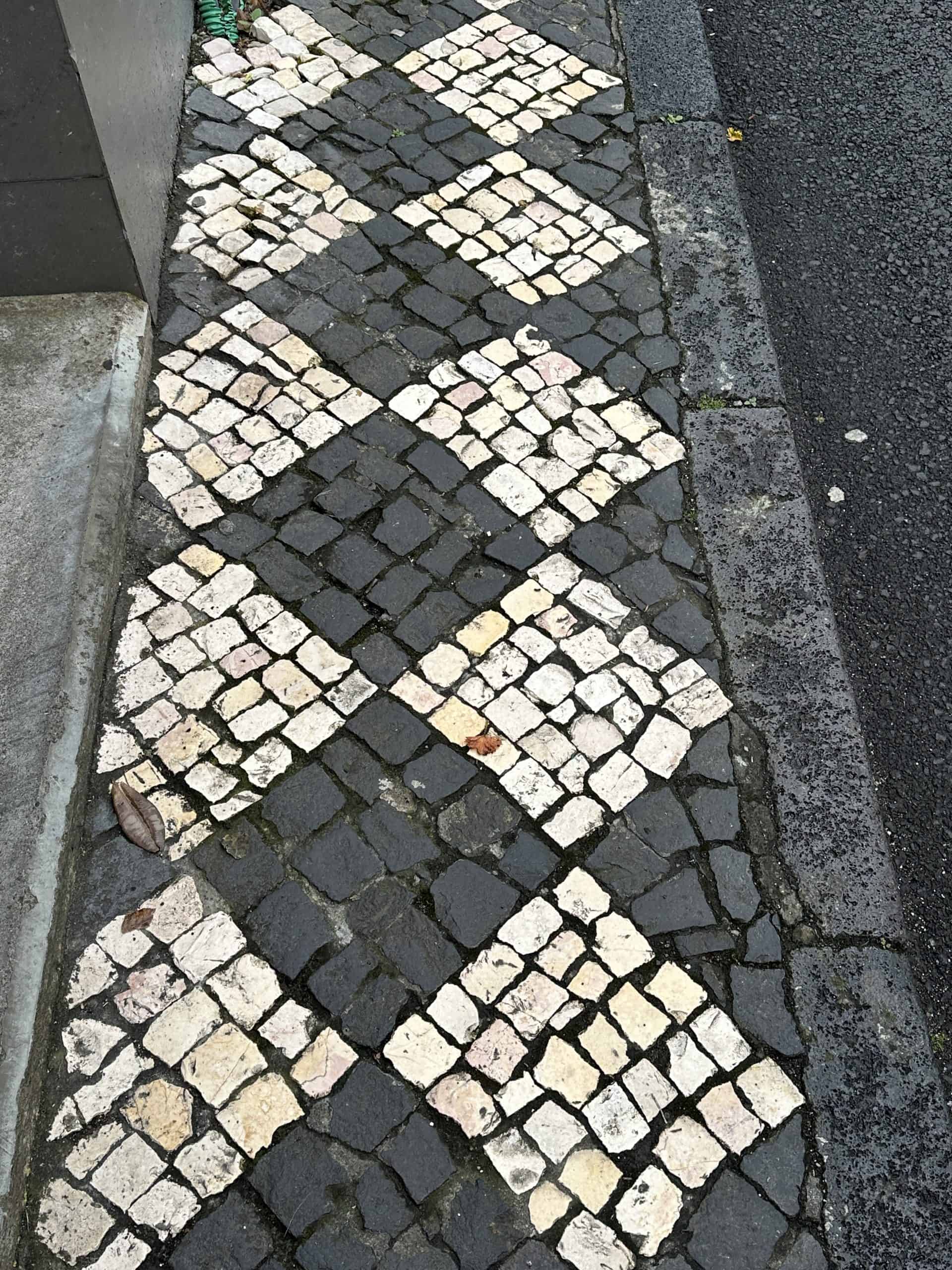 Patterned stones on the sidewalk
