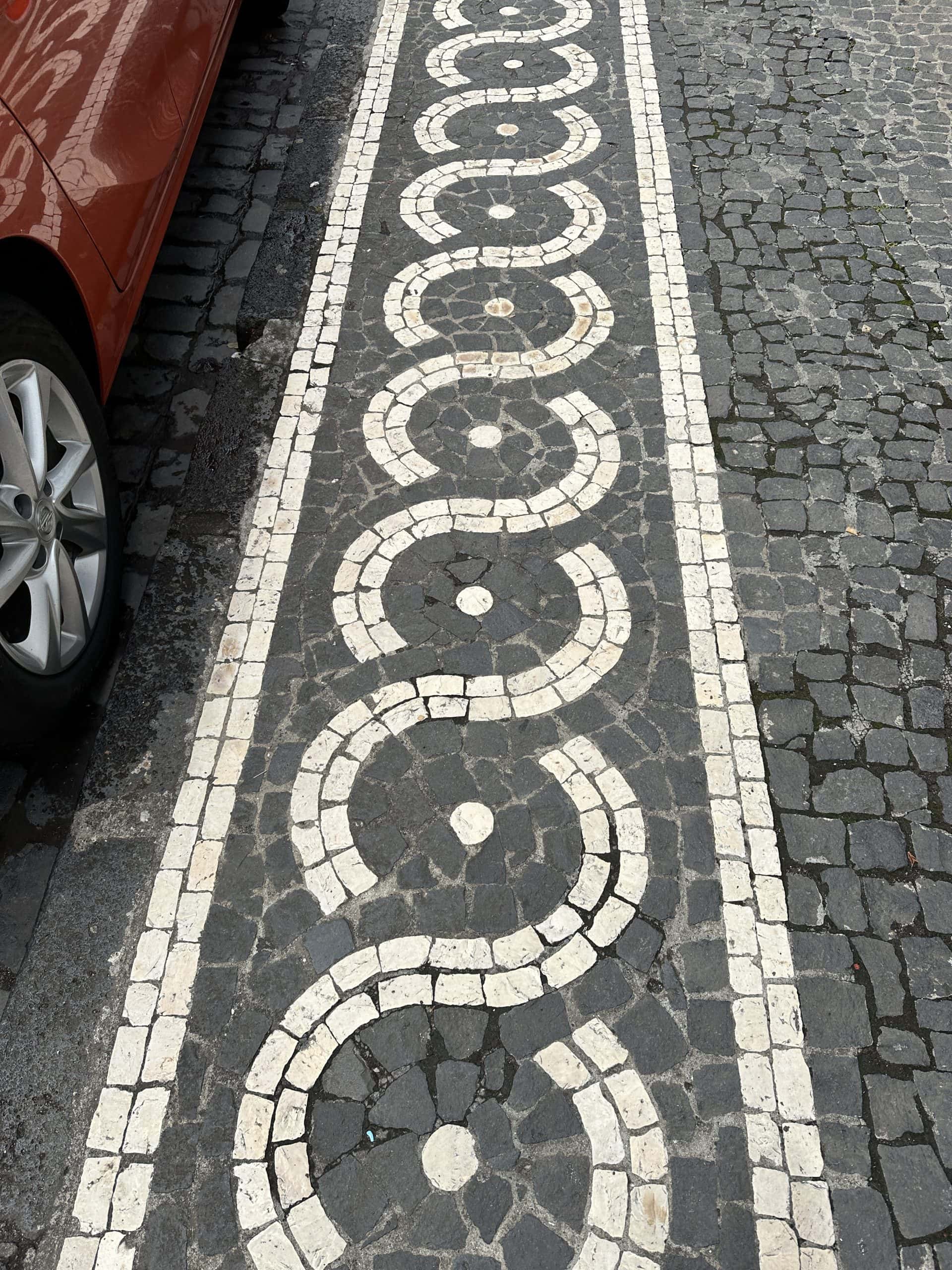 Patterned stones on the sidewalk