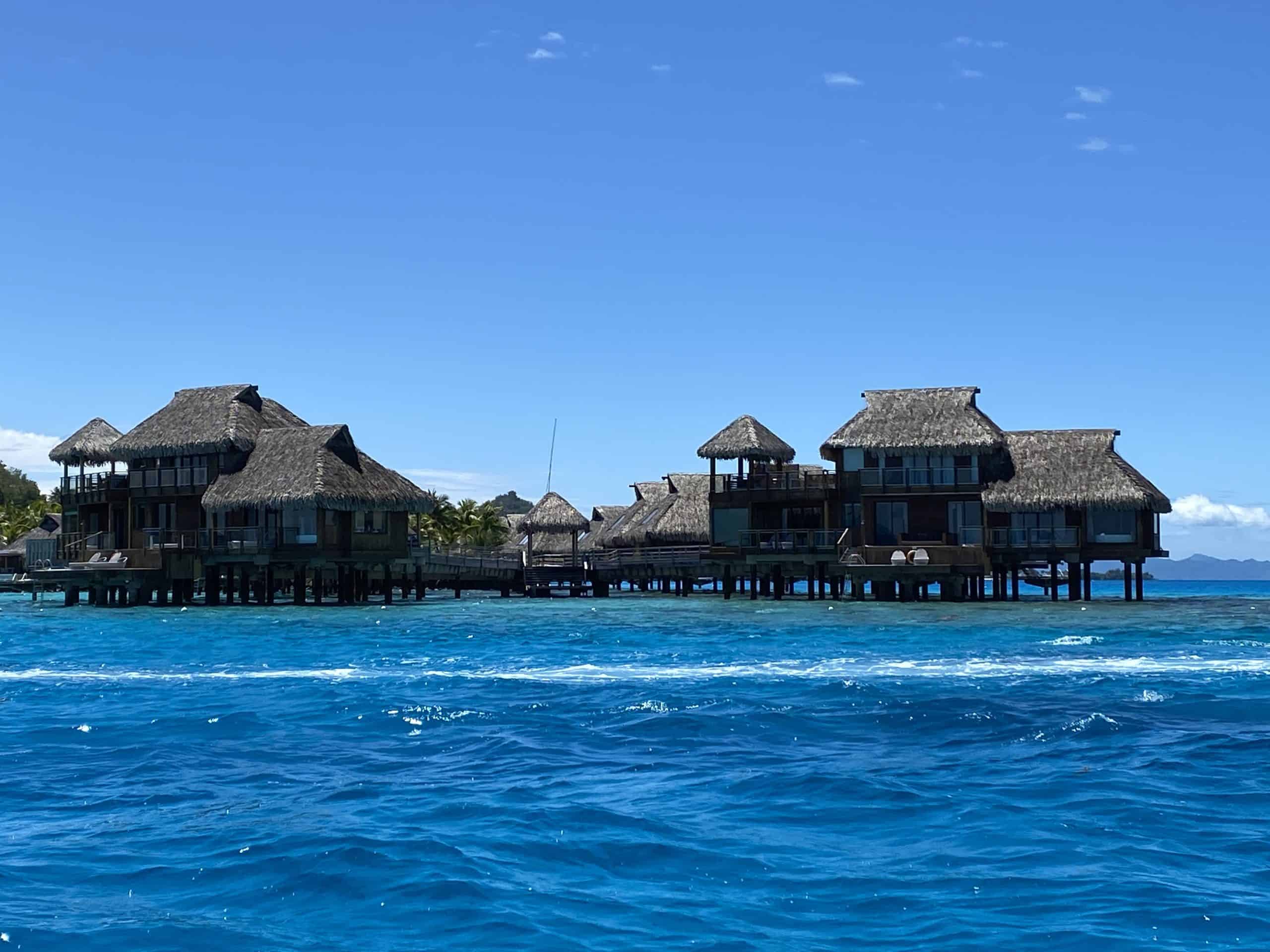 Overwater bungalows at one of the motu resorts