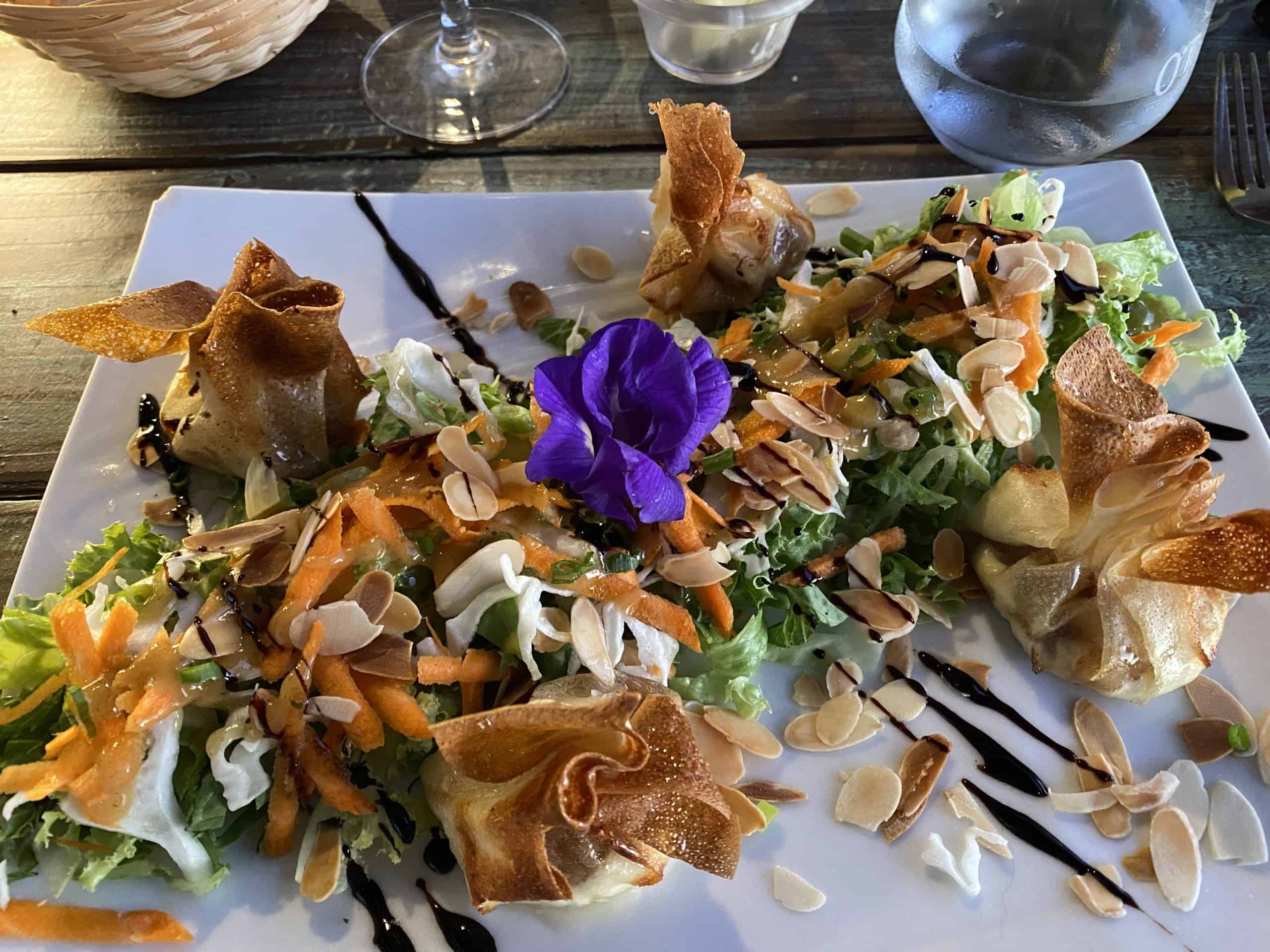 Salad with goat cheese puff pastry