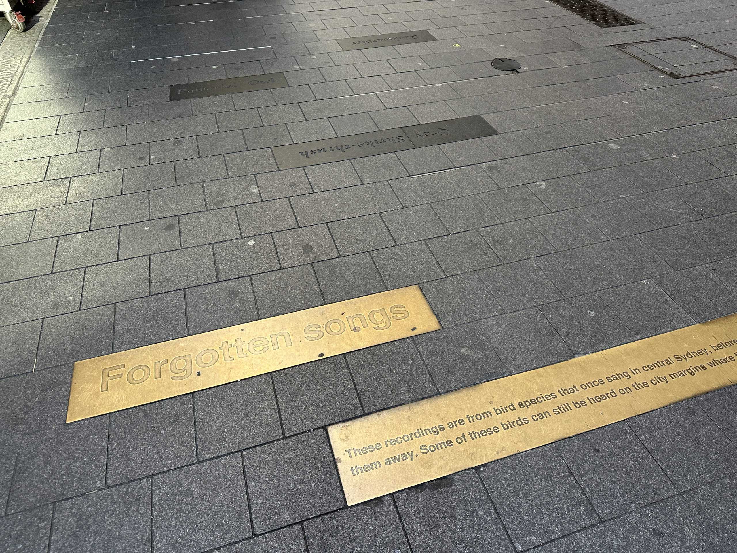 Plaque showing the name of the art piece