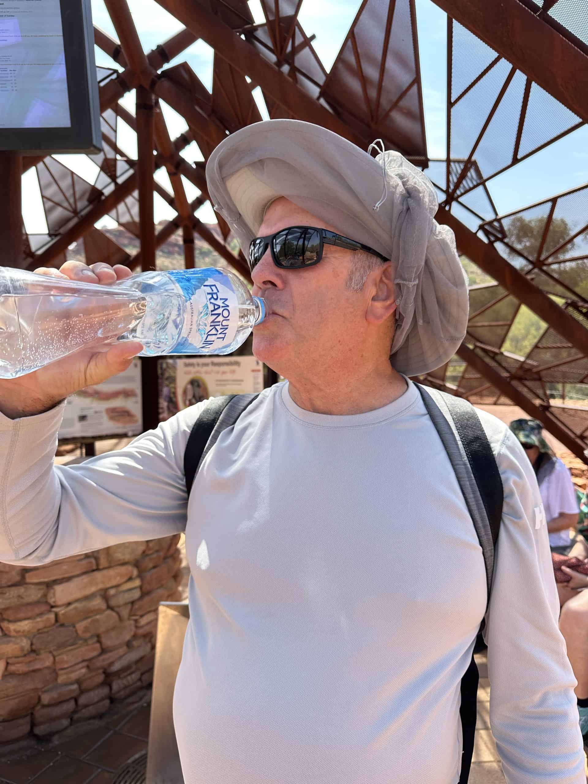 Denis drinking his water
