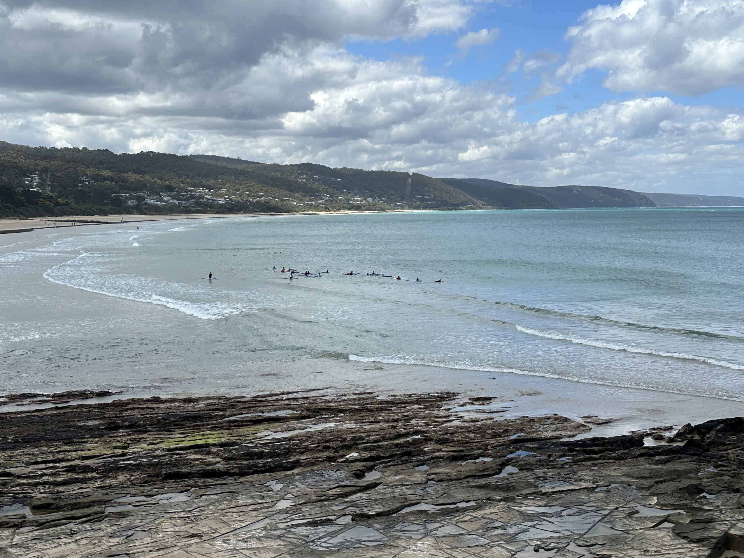 Surfers in the water at Lorne