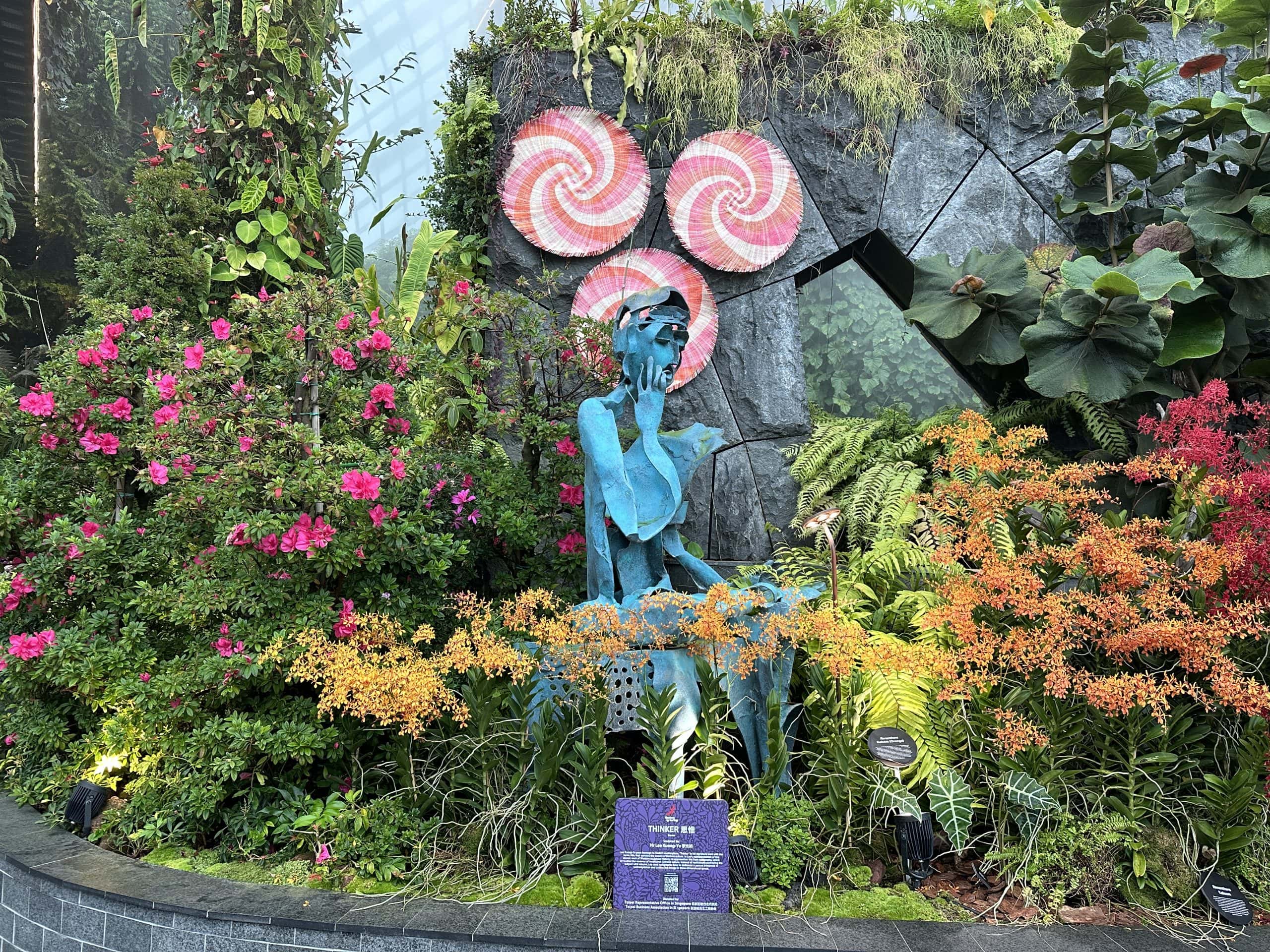 Statuary and colourful flowers