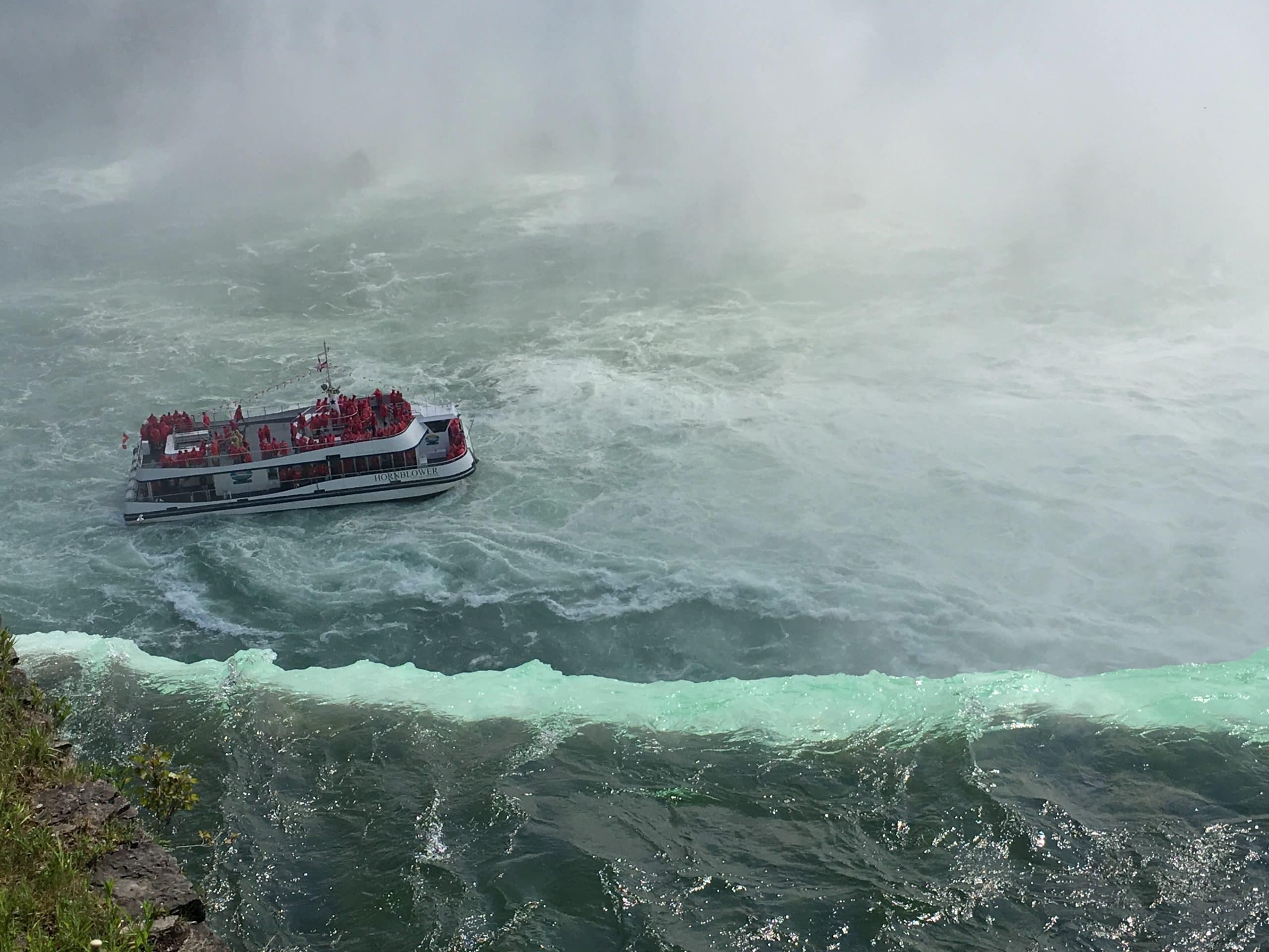 Boat rides at the bottom of the falls