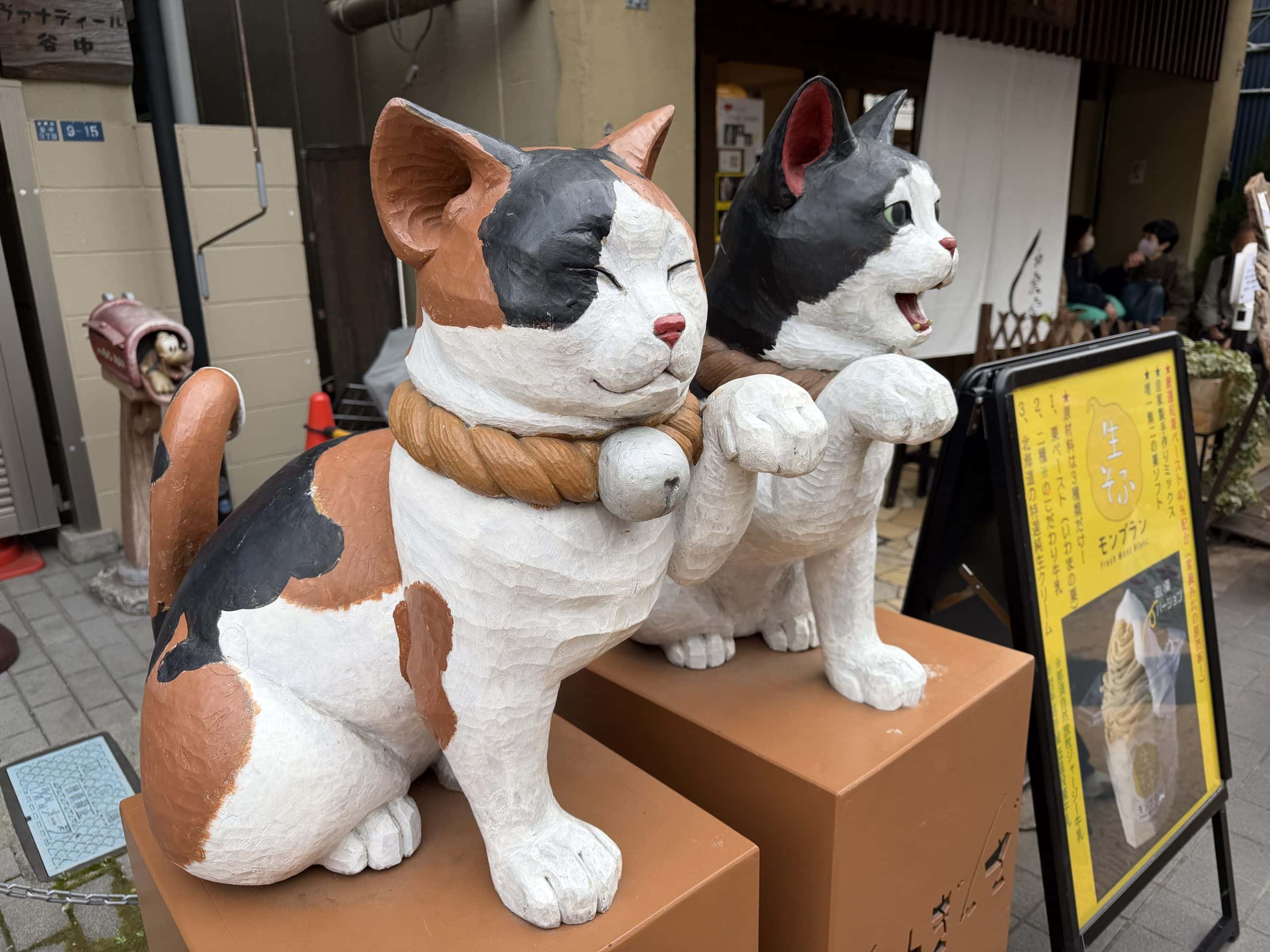 Cat scupltures