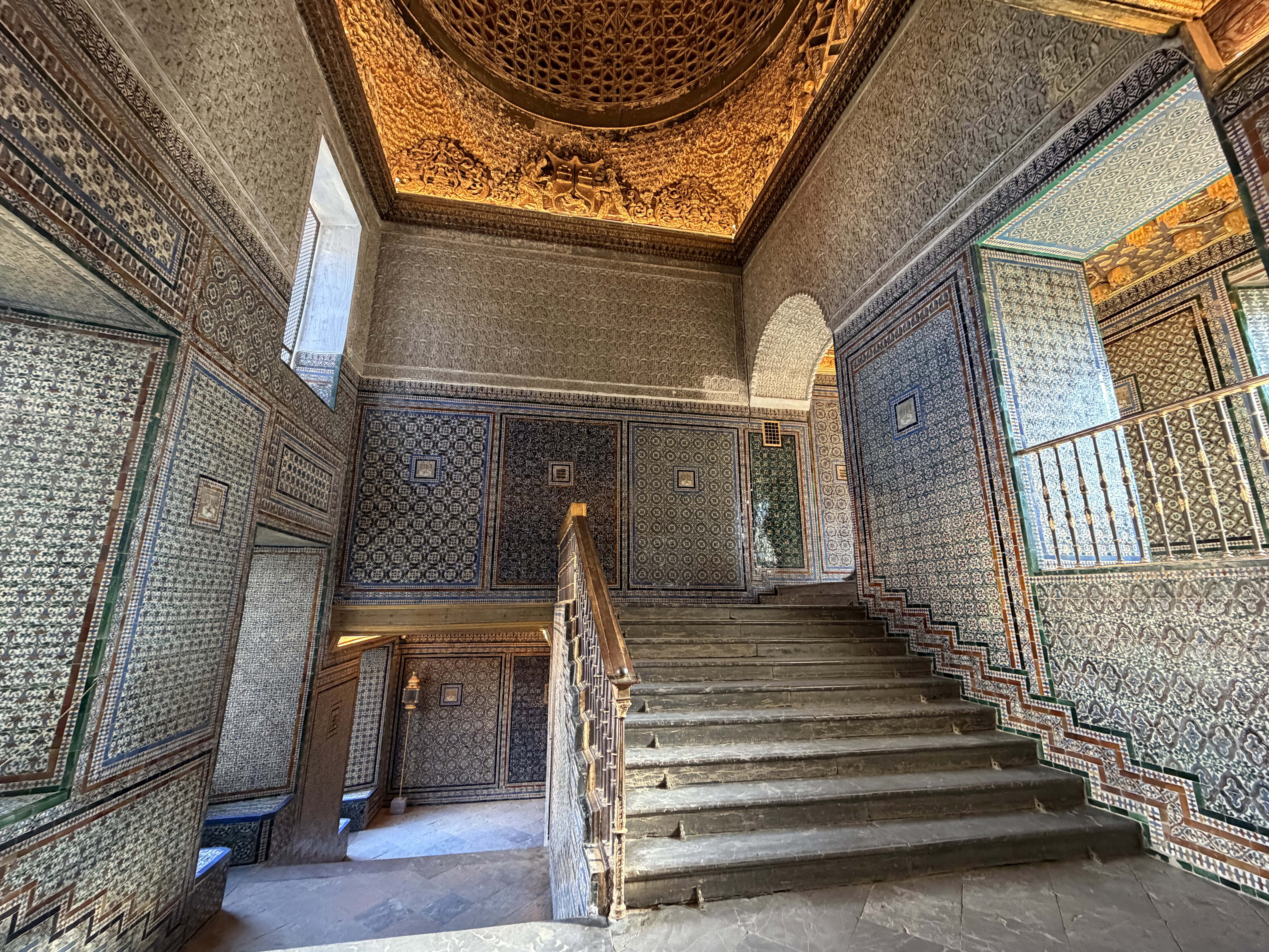 Tiled staircase to the upstairs apartments