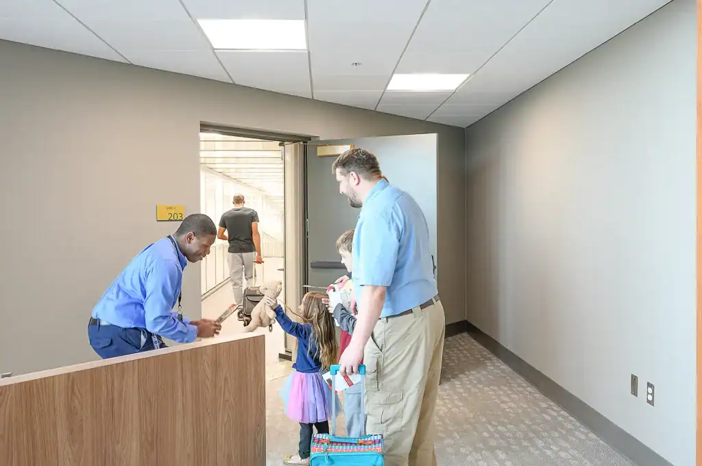 A family boarding a plane at Texarkana Regional Airport