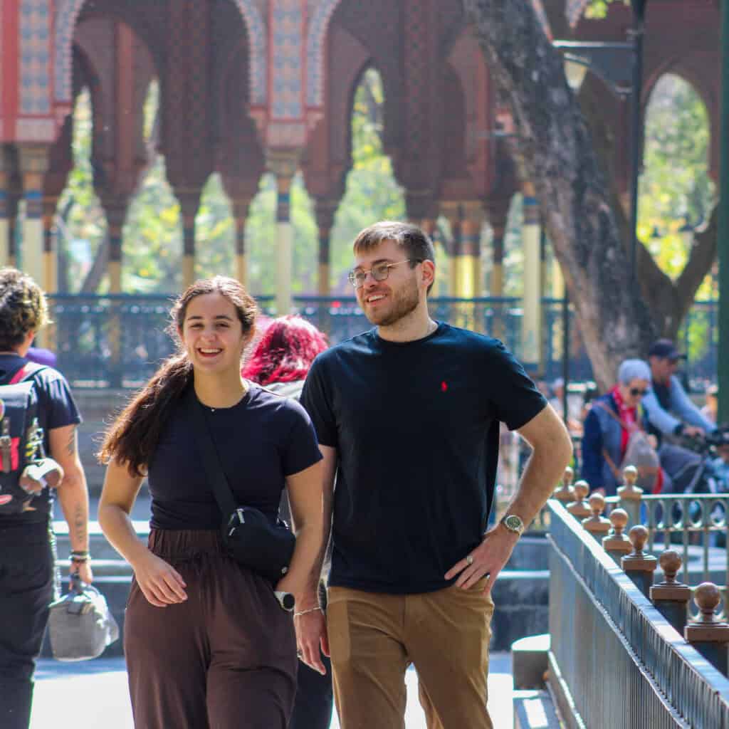 Guests biking through Roma and Condesa neighborhoods during a Food Hood Mexico street food tour.