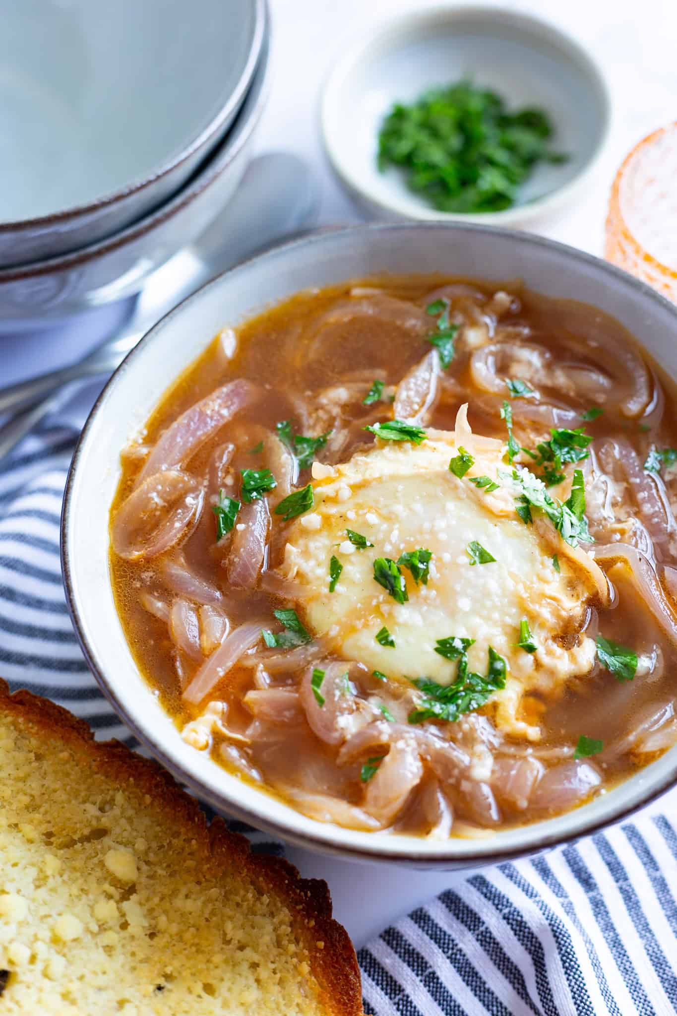 A bowl of Tuscan onion soup with a poached egg on top.