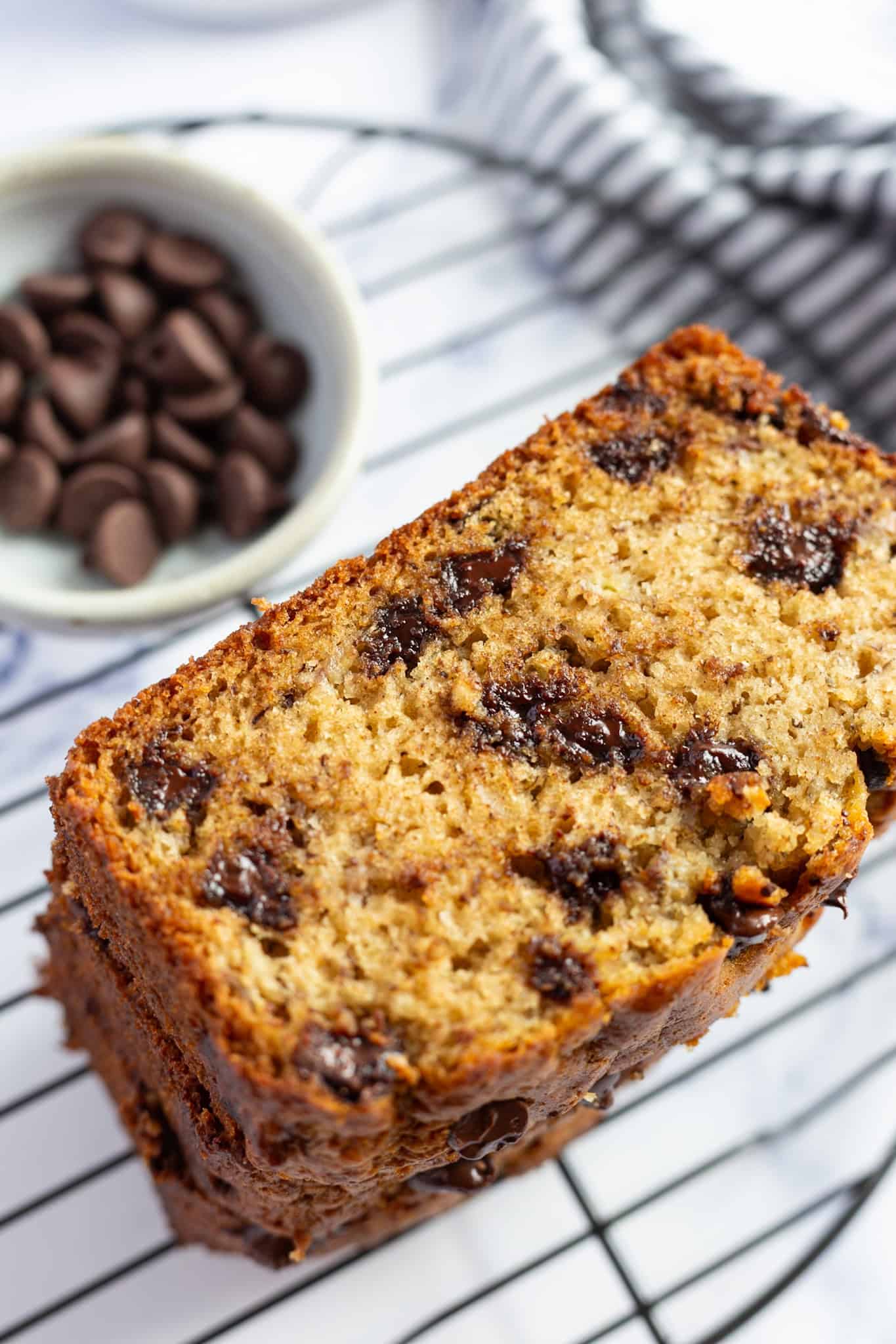 A stack of sliced chocolate chip banana bread.
