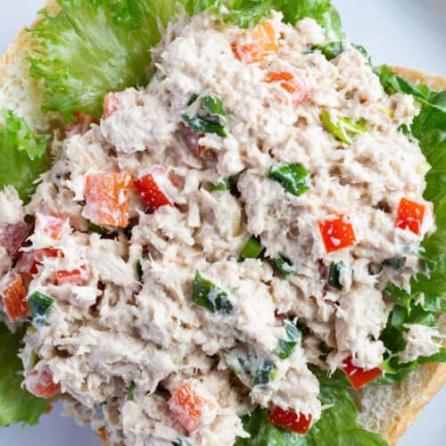 Asian tuna salad with scallions, red bell pepper, toasted sesame seeds, and soy sauce.