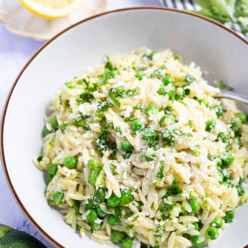 A bowl of summer lemon zucchini orzo.