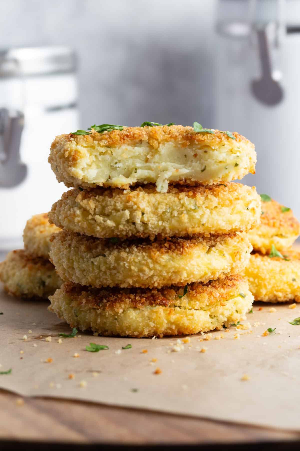 A stack of crispy baked Italian potato croquettes.