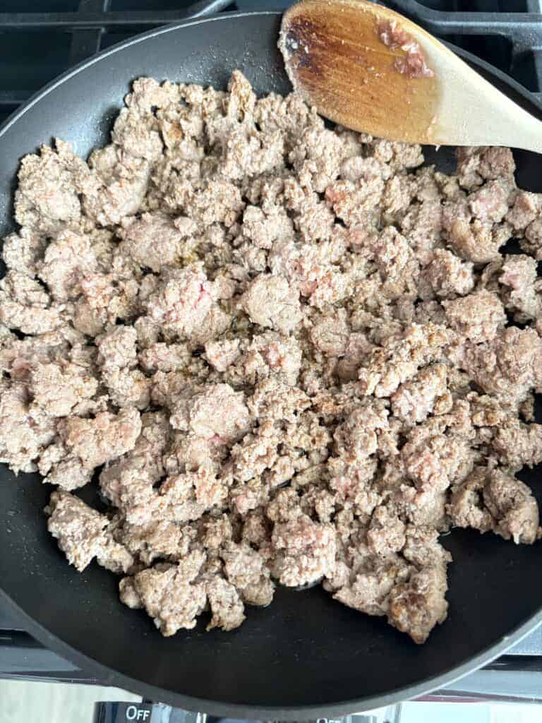 Partially cooked ground turkey.