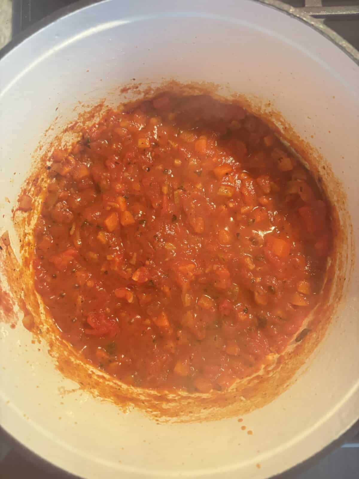 Simmered fire-roasted tomatoes with seasonings.