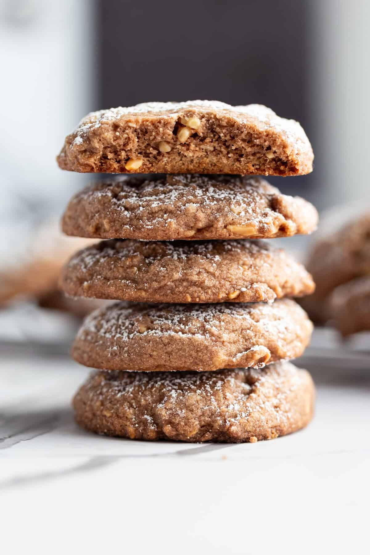 A stack of almond cocoa powder cookies.