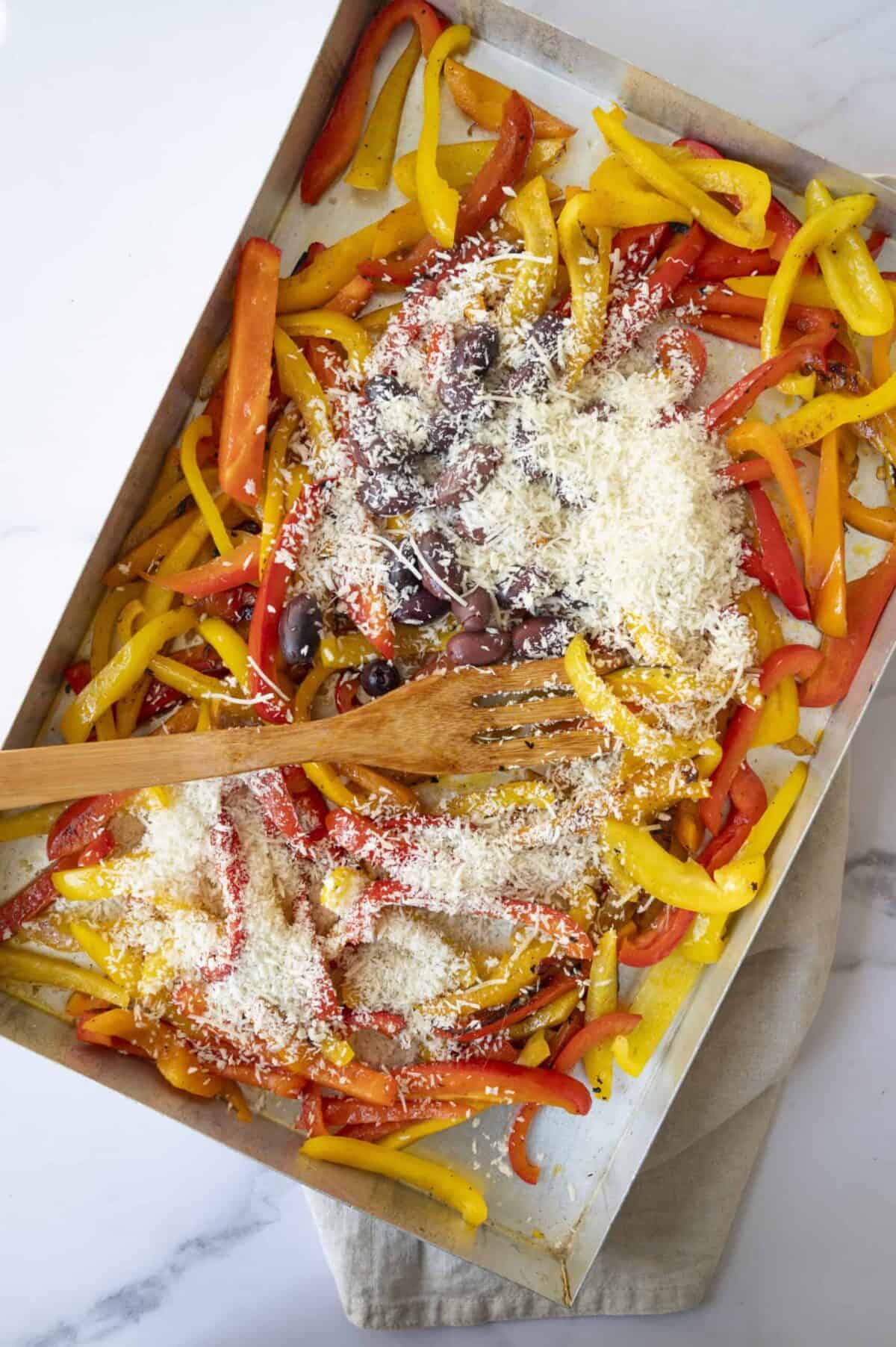 A pan of roasted peppers with olives and Panko.