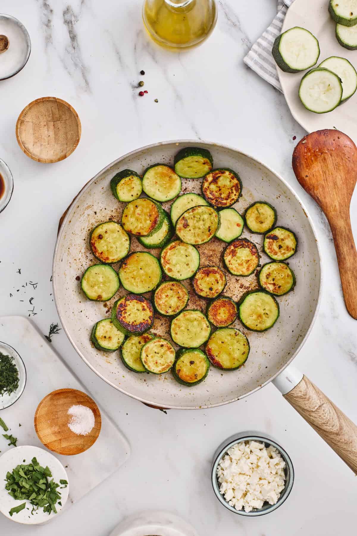 A pan of golden-brown zucchini.