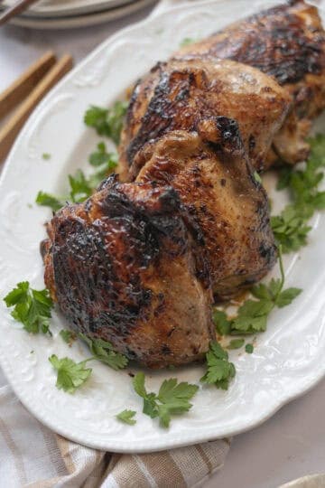 A plate of juicy chicken thighs.