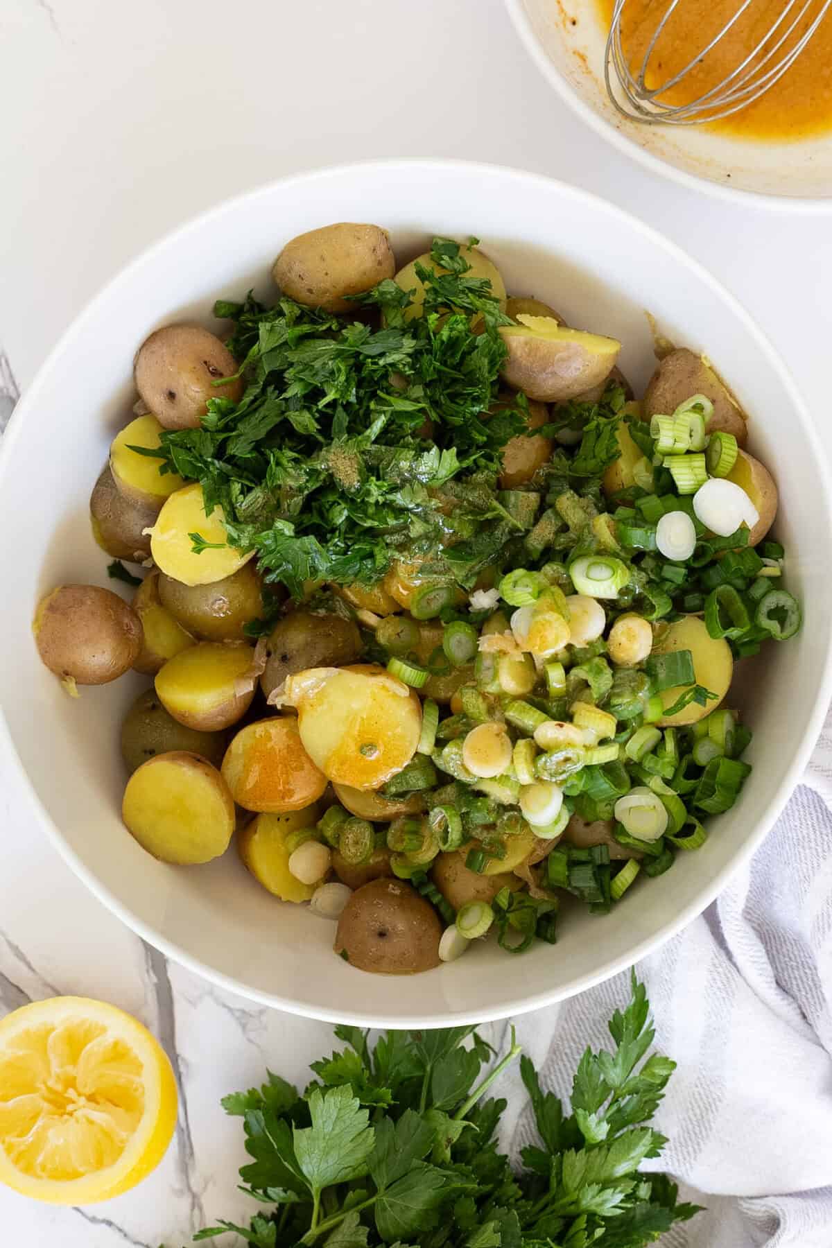 Boiled potatoes tossed with vinaigrette and herbs.