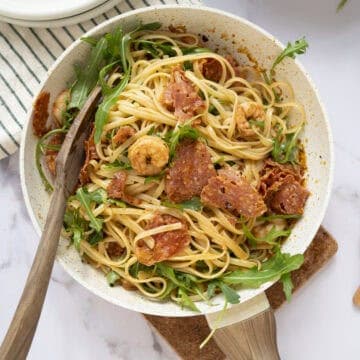 A pan of linguine tossed with shrimp and chorizo.