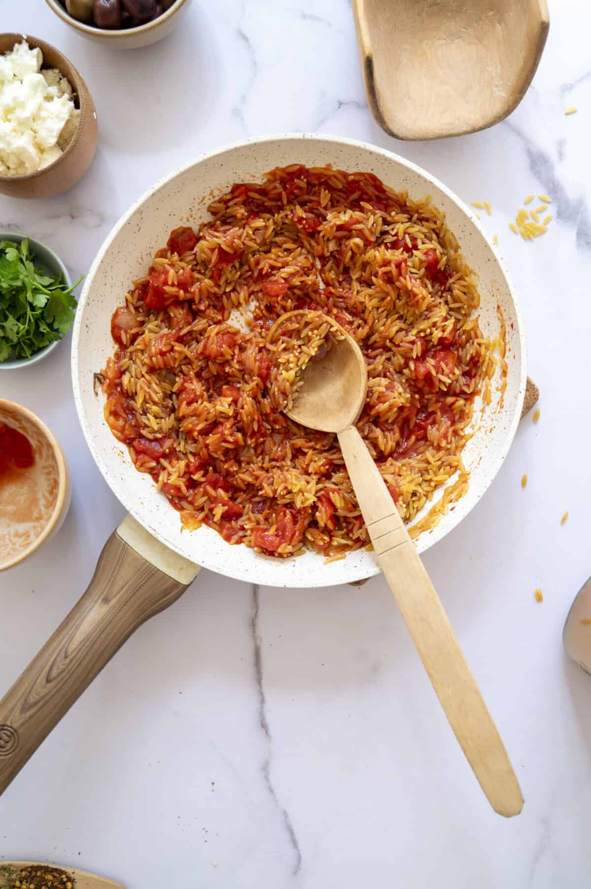 A pan of toasted orzo.