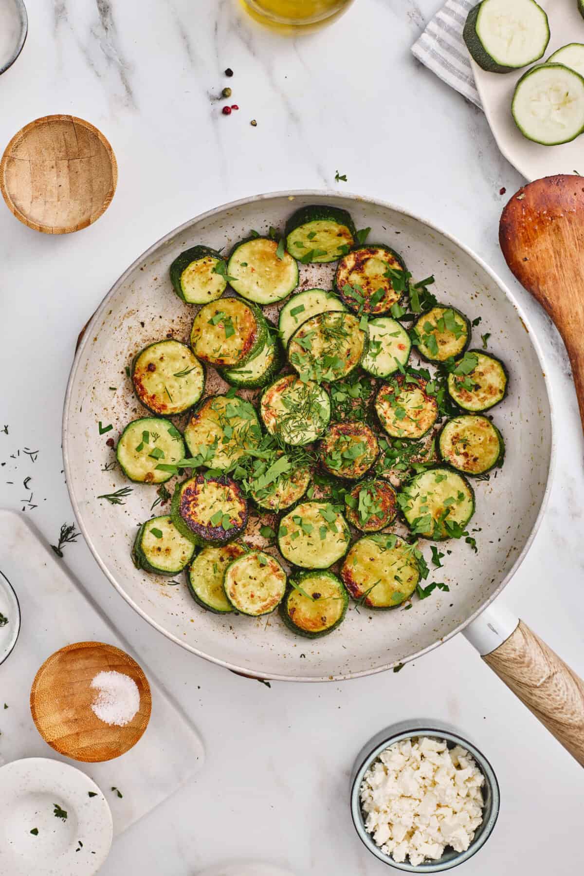 A pan of zucchini and herbs.