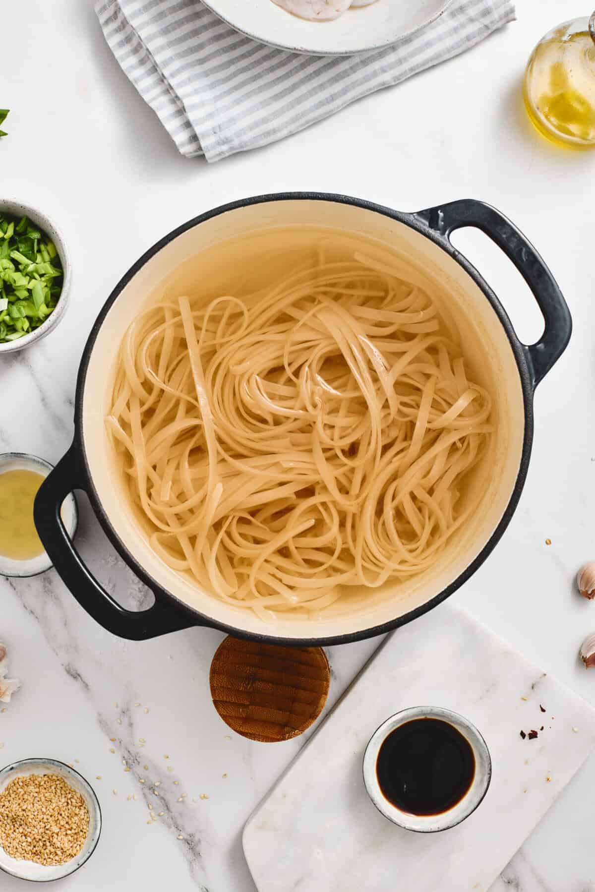 A pot of boiling noodles.