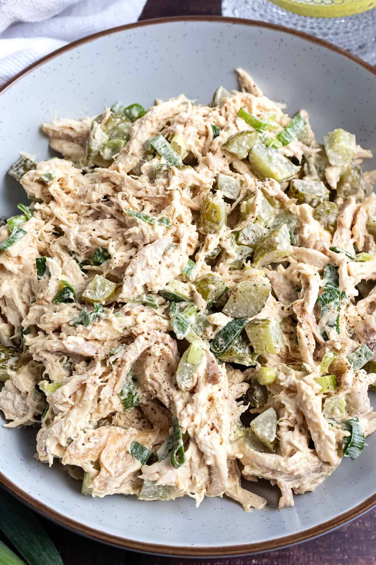 Chicken salad with dill pickle and mayo.