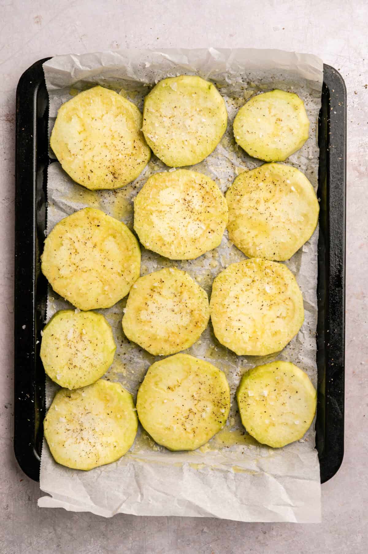 A pan of seasoned eggplant slices.